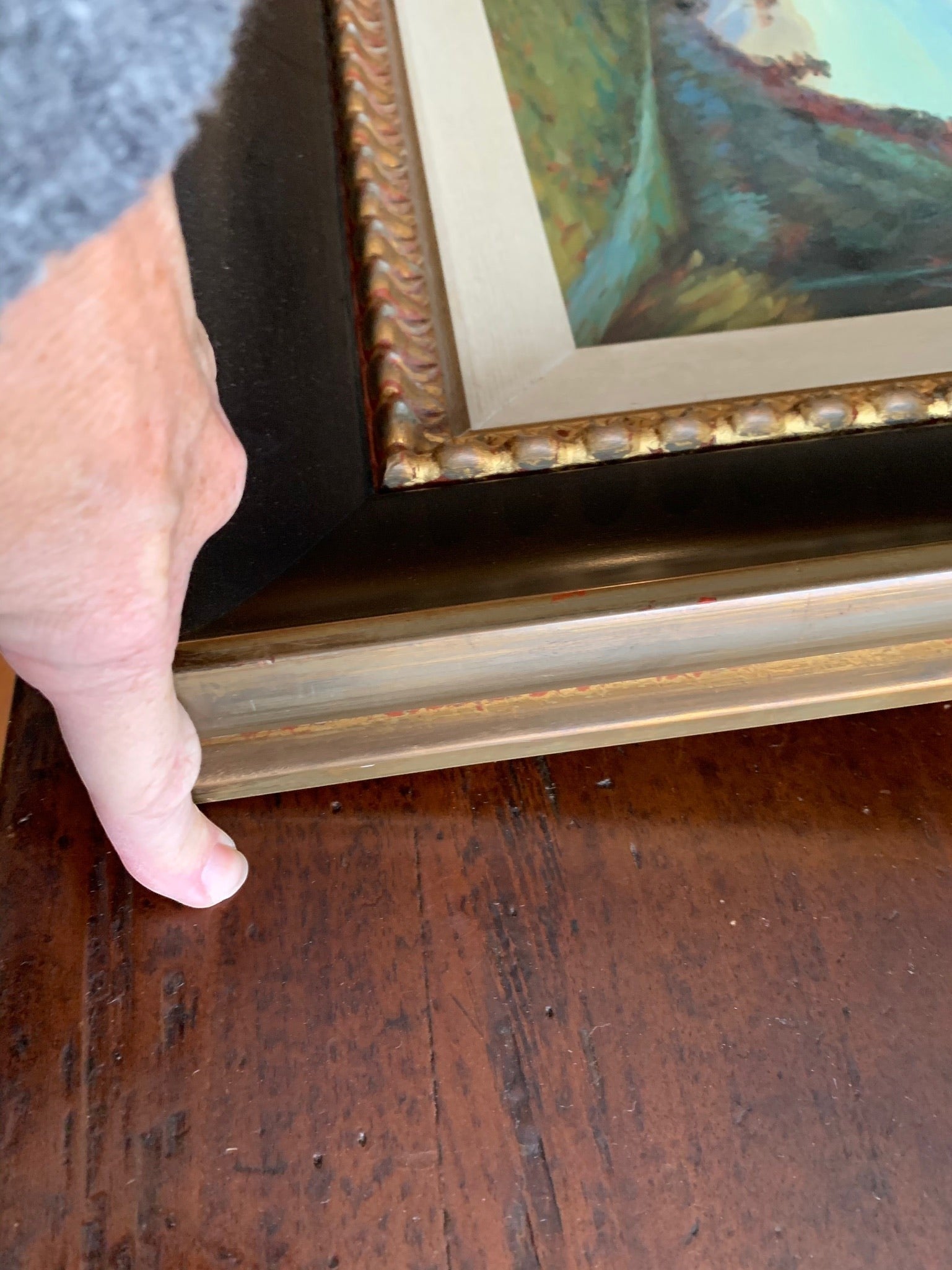 Grand Expressions Gallery and Home Store Passage Way oil painting in a decorative gold and black frame.