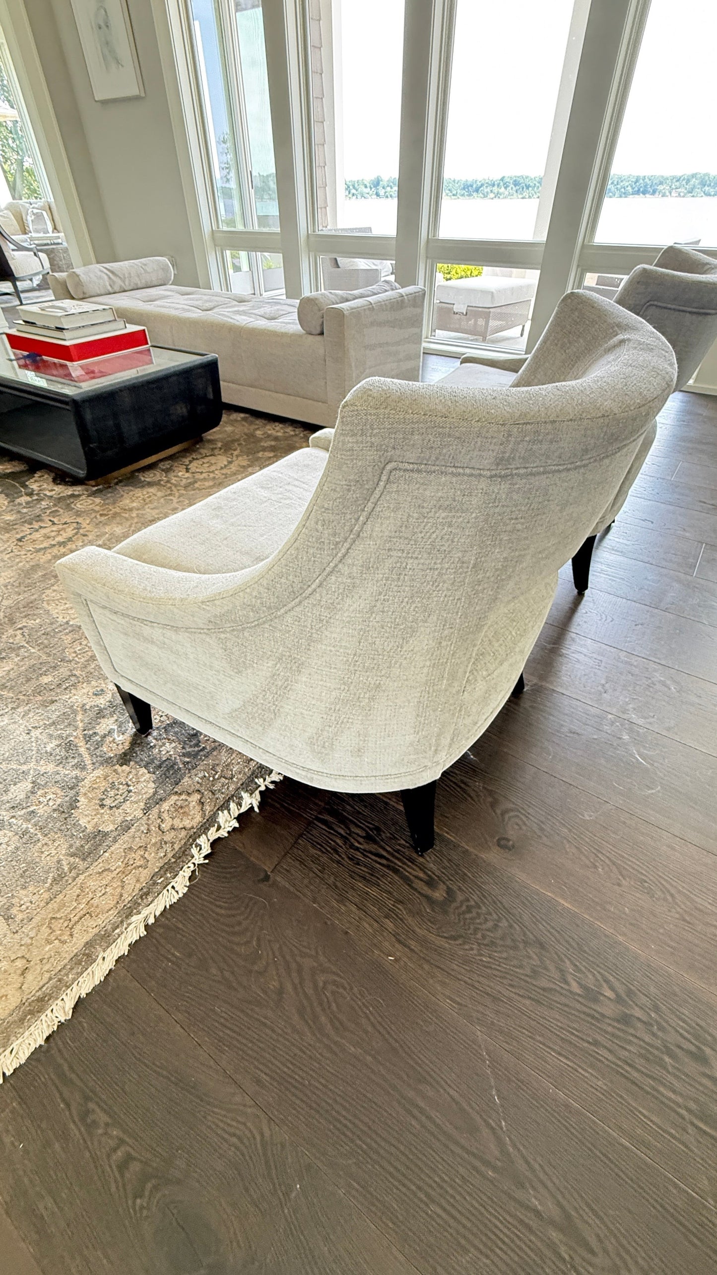 Baker/McGuire Piedmont Lounge Chair in light grey fabric with exposed wood legs at Grand Expressions Gallery and Home Store