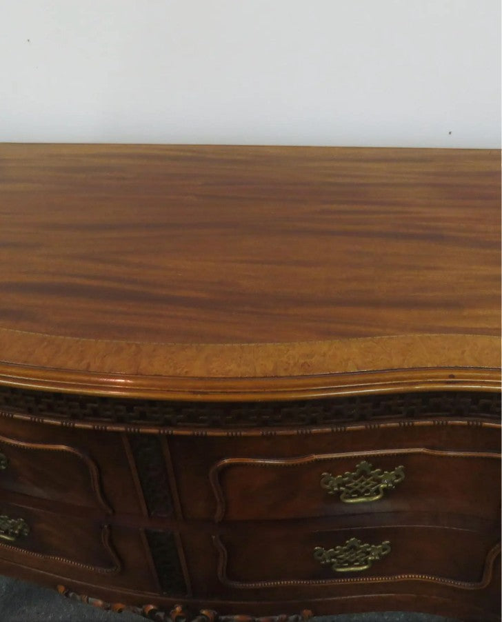 Vintage Robert W. Irwin Company chest of drawers at Grand Expressions Gallery and Home Store with intricate carvings.
