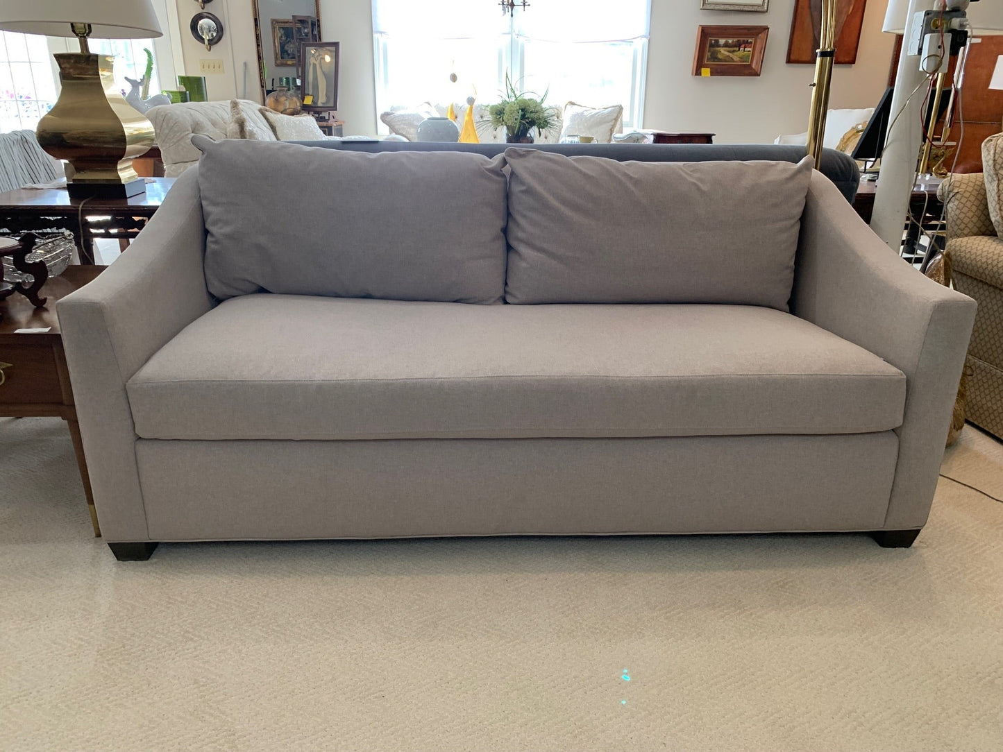 Grand Expressions Gallery and Home Store Sullivan sofa by Maiden Home in light grey with shelter arms and bench seat.