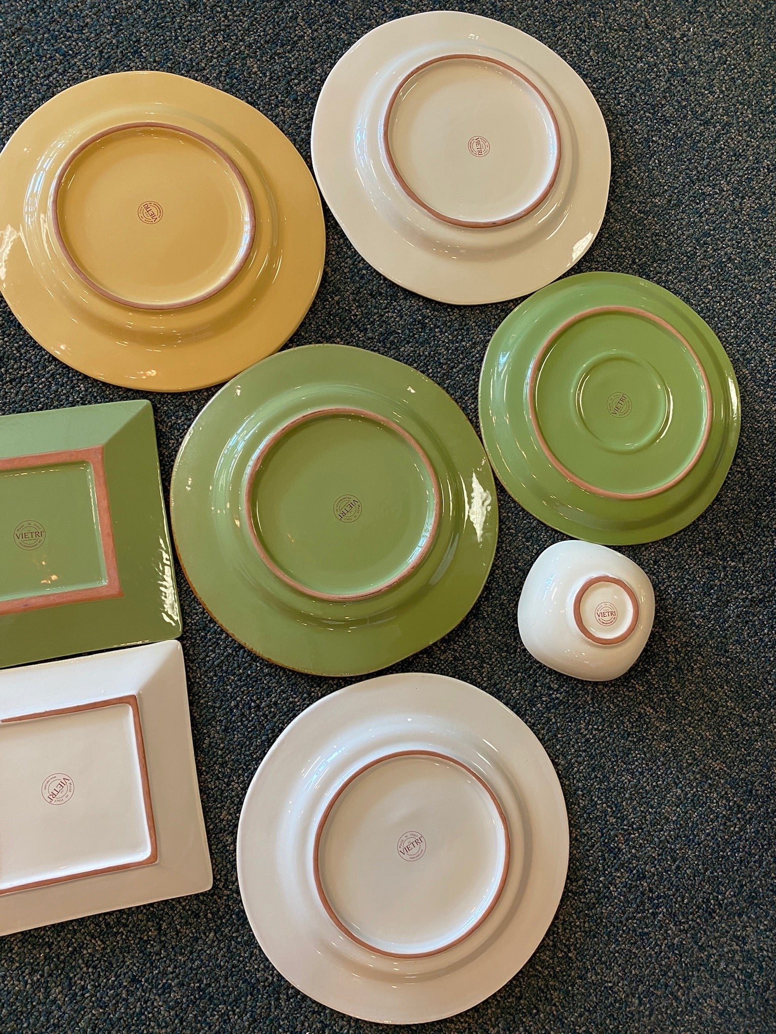 Grand Expressions Gallery and Home Store Vietri Cucina Fresca Italian clay dinnerware set in assorted colors.