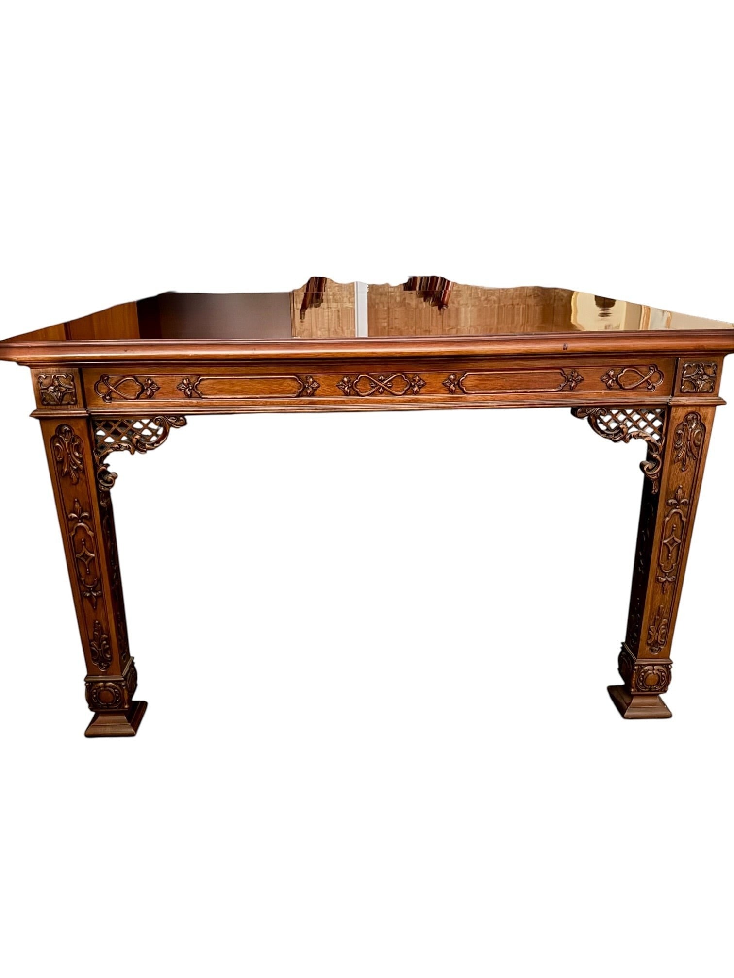 Grand Expressions Gallery and Home Store vintage Asian style dining table with intricate wood carvings and detailing.