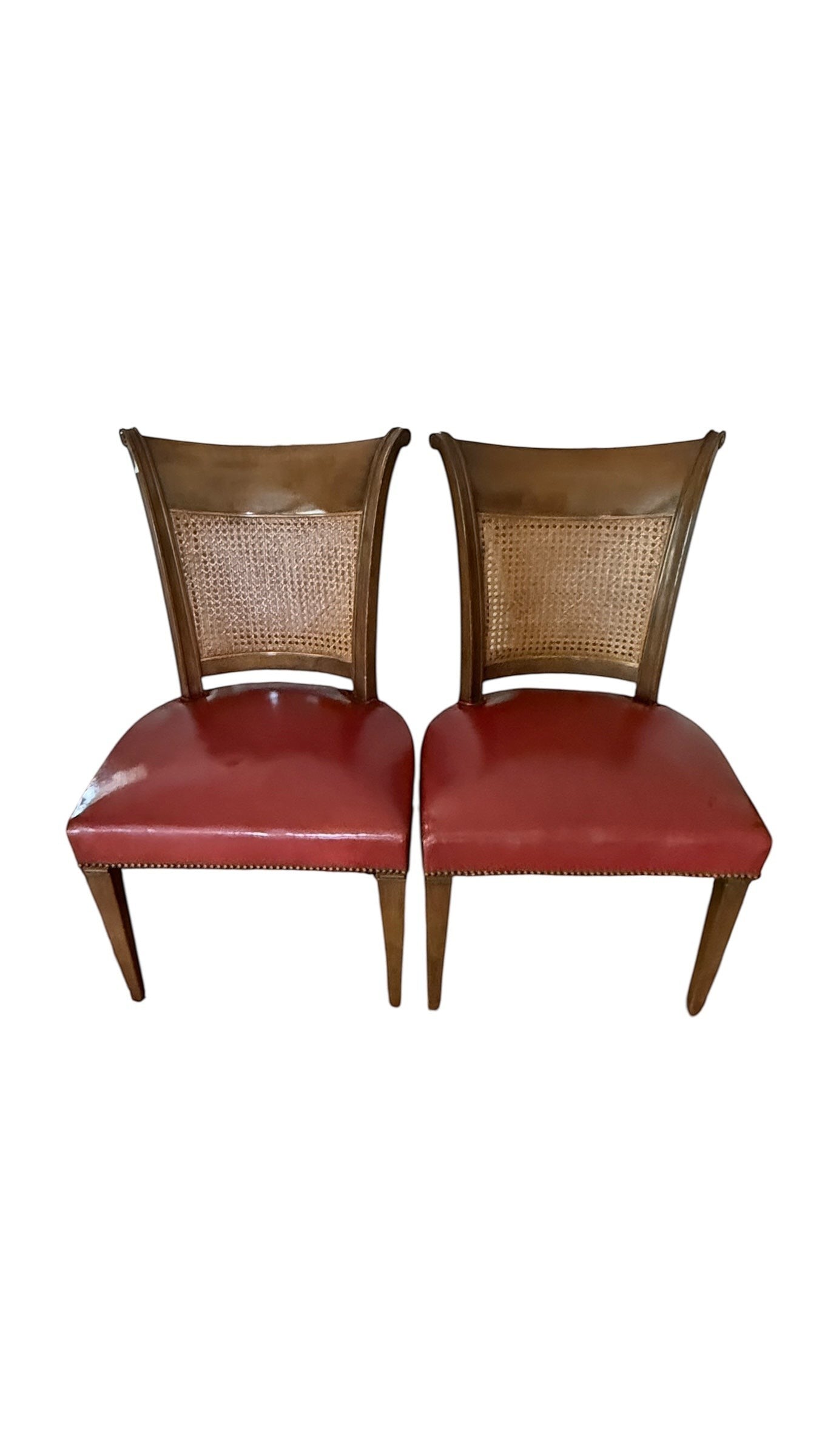 Grand Expressions Gallery and Home Store vintage Baker dining chairs with cane backs and red leather seats.