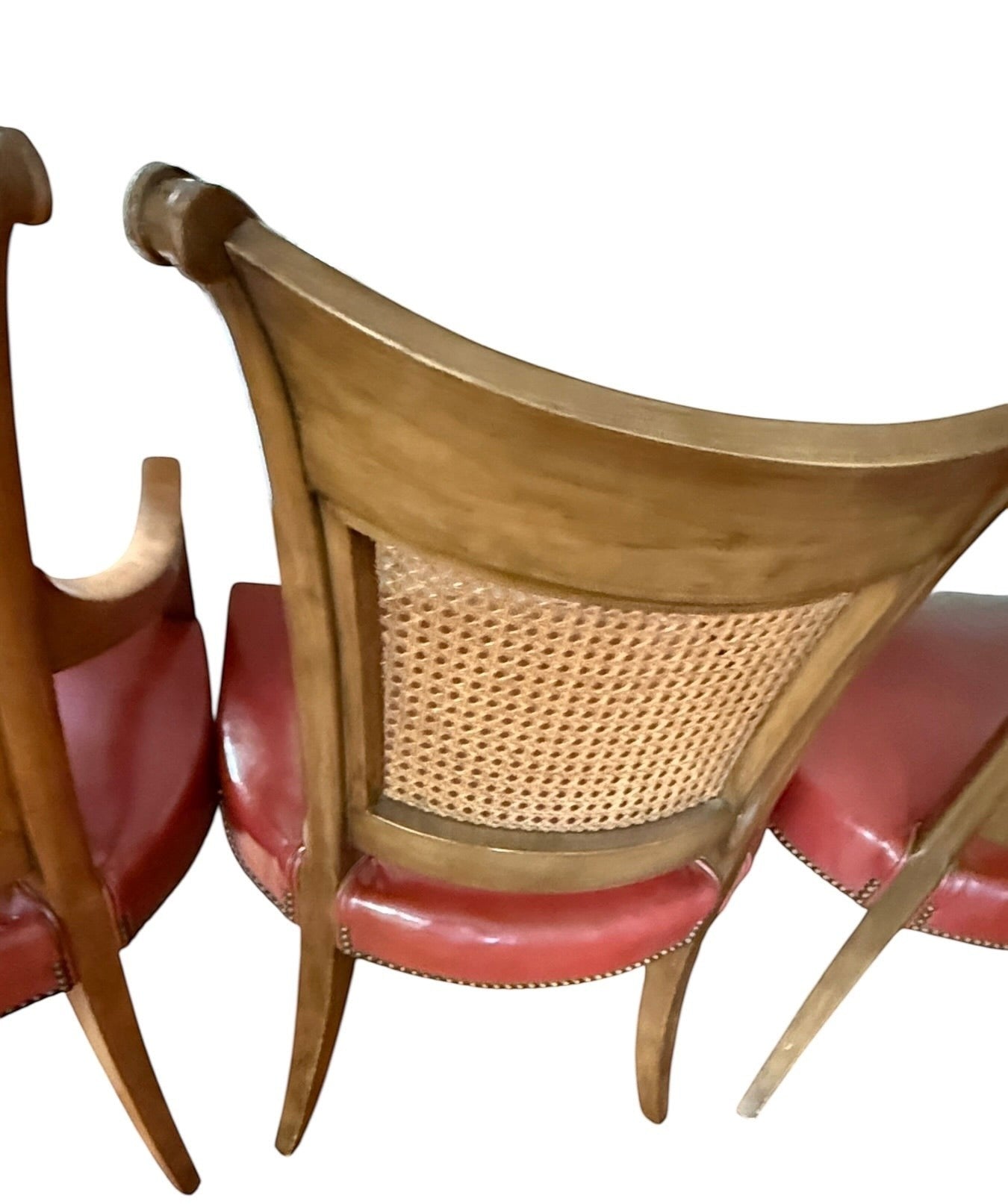 Set of 4 Grand Expressions Gallery and Home Store vintage dining chairs with cane backs and red leather seats.