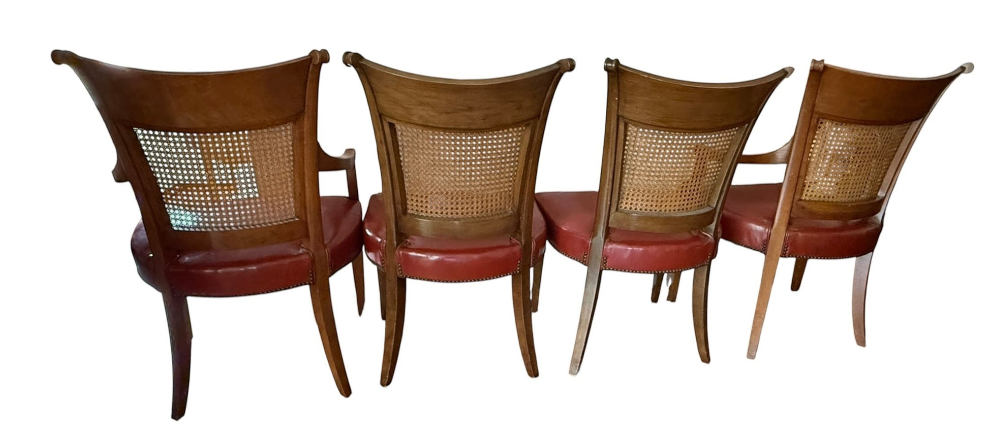 Set of 4 vintage Grand Expressions Gallery and Home Store Baker dining chairs with cane backs and red leather seats.