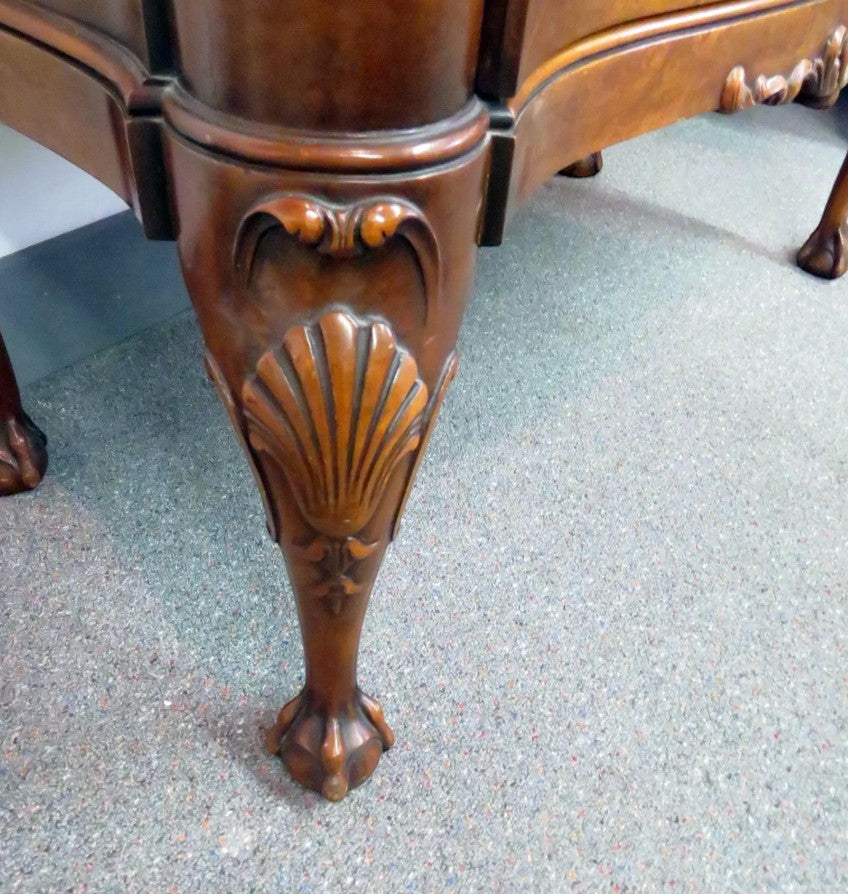 Grand Expressions Gallery and Home Store vintage Robert W. Irwin chest of drawers with carved shell and claw feet.