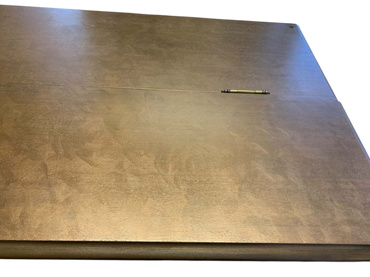 Close-up of the polished walnut wood surface of a vintage Edwardian spinet desk from Grand Expressions Gallery and Home Store.