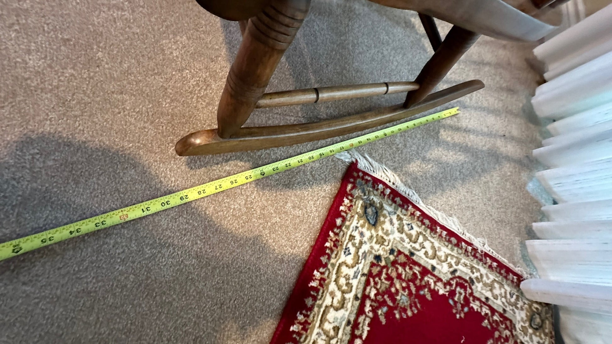 Grand Expressions Gallery and Home Store vintage Ethan Allen wood rocking chair base with measuring tape for scale