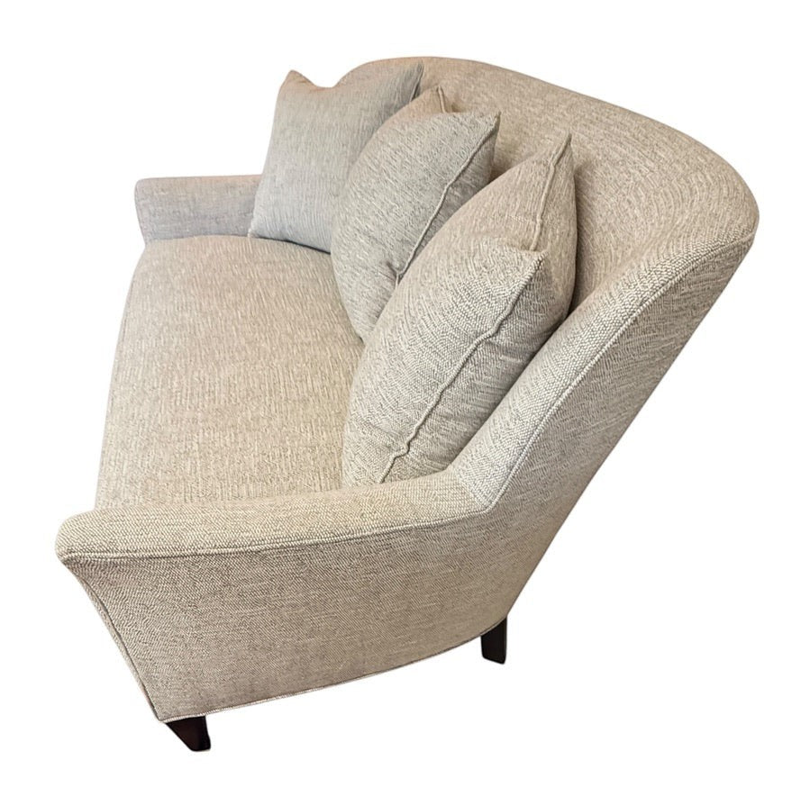 Wesley Hall Sanford settee in light grey-beige performance fabric with tapered arms and four matching throw pillows.