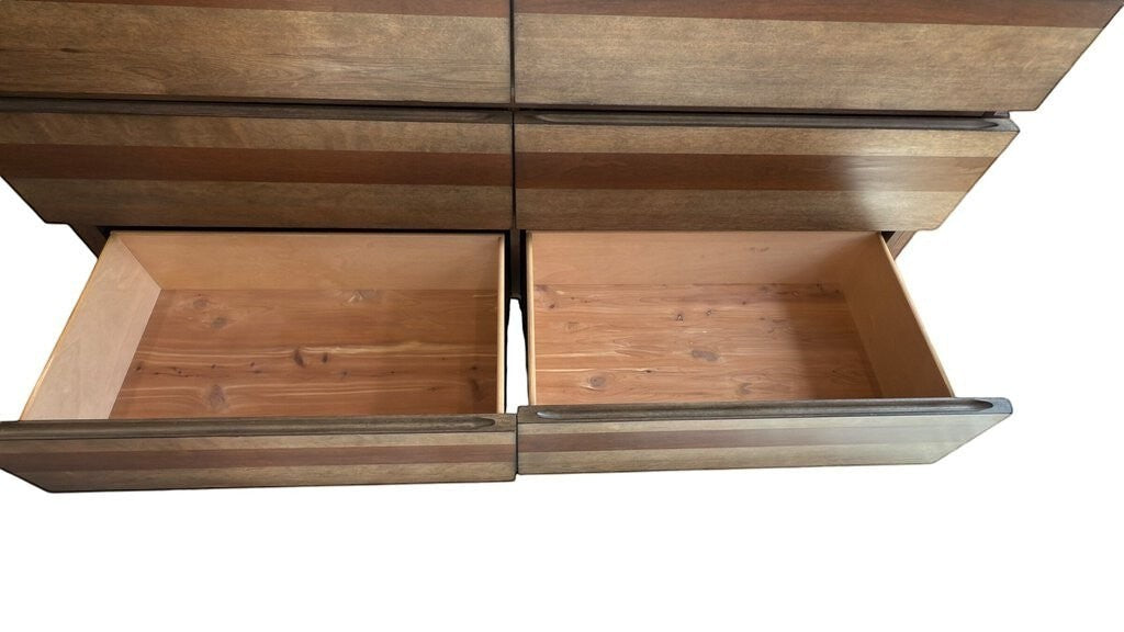 Grand Expressions Gallery and Home Store A.R.T. Furniture wood 6-drawer dresser with cedar-lined bottom drawers.